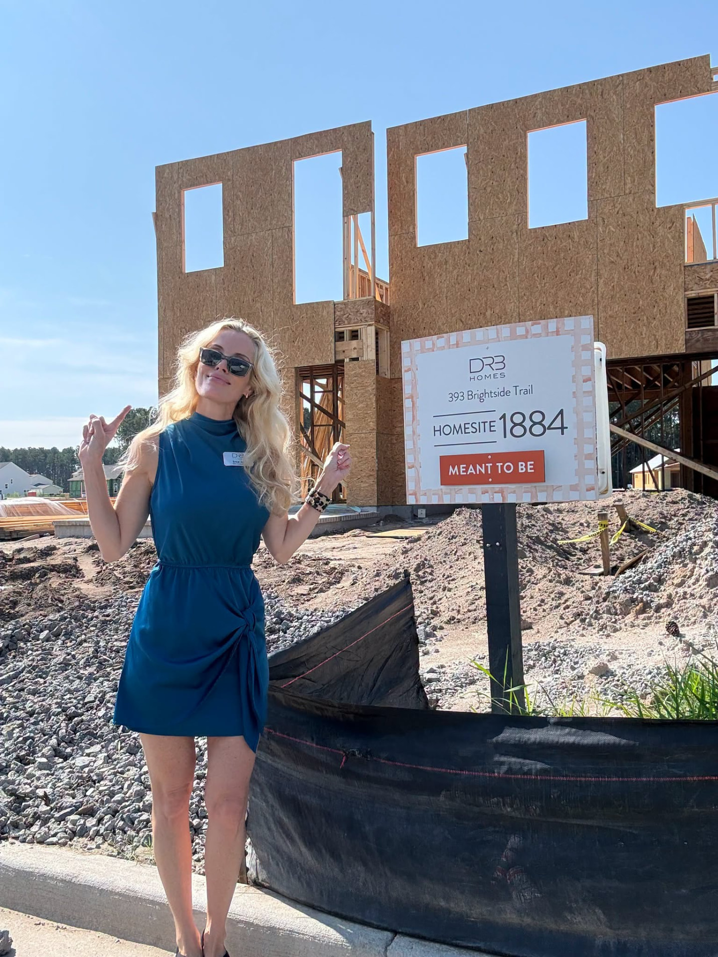 Erica Joy at DRB homesite 1884 with framing underway
