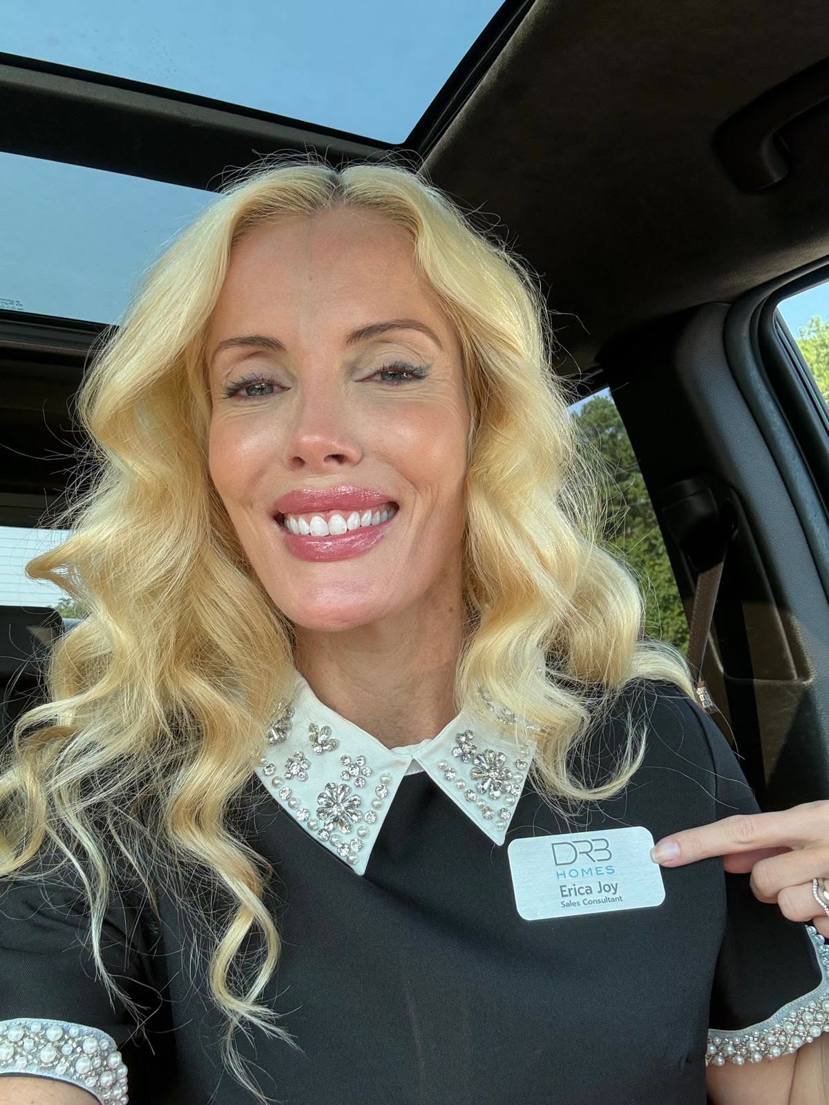 Erica Joy wearing her DRB Homes name badge